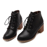 Botas bajas con cordones y cremallera lateral
